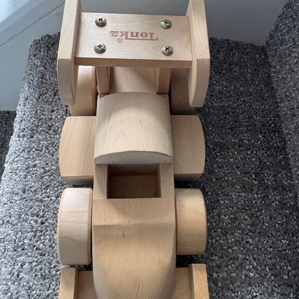 Wooden Tonka race car, wheels move, natural wood.